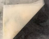 A picture of step 7 of Vegetarian Filo Samosas Filled with Four Cheeses and Spinach.