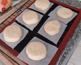 Foto del paso 7 de la receta: Berlinas rellenas de crema y coulis de cerezas con ganache de chocolate
