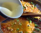 Foto del paso 3 de la receta: Arroz con surtido de mariscos en conserva tipo paella 🥘