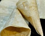 Une image de l'étape 1 de Cônes de wraps avocat, kiwi et truite fumé.