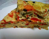 Foto del paso 8 de la receta: Tortilla de calabacín y pimiento rojo
