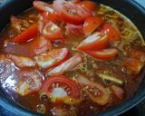 A picture of step 4 of Khanom Jeen Nam Ngiao with Seasoned Pork Meatballs.