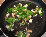 A picture of step 3 of Meen Pollichathu- Kerala style fried fish steamed in banana leaf.