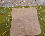 Foto del paso 2 de la receta: Enrollados de pesto y salchichas al horno