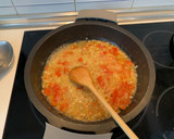 Foto del paso 4 de la receta: Calamares en su tinta con arroz blanco