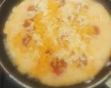 A picture of step 4 of Two cheese and cherry tomato omelette :).