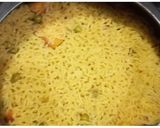 A picture of step 11 of Tahri or spicy pulav.