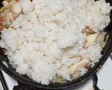 Foto del paso 2 de la receta: Arroz hervido que me sobró con pechuga rebozada ❣
