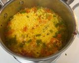 A picture of step 7 of Yellow Rice with Jalapeños and Tomatoes.