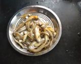 A picture of step 1 of Mourala Macher Jhal.