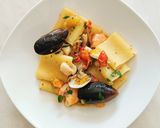 A picture of step 4 of Paccheri ai frutti di mare.