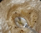 A picture of step 12 of Maharashtrian Lunch Thali of Bhakri, Vangyache Bharit, Phodniche Varan, Gul aani Tup.