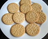 A picture of step 2 of Marie Biscuits Log Cake.