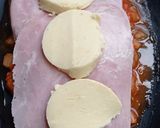 Foto del paso 6 de la receta: Milanesa a la napolitana con cebollas caramelizadas