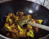 A picture of step 4 of Fish curry with potatoes and cauliflower.