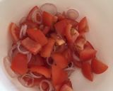 A picture of step 1 of Tomato & Onion Salad.