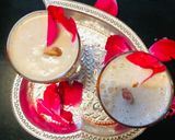 A picture of step 4 of Thandai with rose petals.