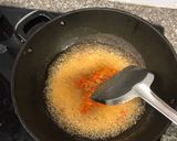 Hình bước làm 2 của món Ốc hương rang muối ớt