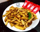 A picture of step 5 of Masala French fries.