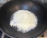 A picture of step 1 of Kerisik - Coconut Butter - Used in Indonesian / Asian cooking.