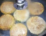 A picture of step 4 of Beguni ghoti gorom.