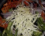 A picture of step 6 of Jollof rice and stir fry veggies with chicken #hubyfavouritedish.