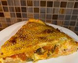 Foto del paso 10 de la receta: Torta de jamón, provolone, tomate y albahaca