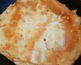 A picture of step 2 of Chicky egg sandwich.