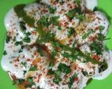 A picture of step 11 of Dahi Bhalle Dahi Wada.