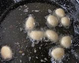 A picture of step 3 of Doughnut balls.
