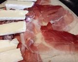 A picture of step 3 of Speck, brie and red onion piadina.