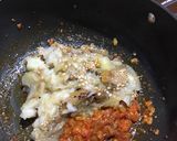 A picture of step 6 of Brinjal bharta.