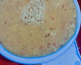 A picture of step 3 of Orange twister juice.