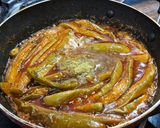 A picture of step 8 of Chok Wangun (Kashmiri-style Tangy Brinjals).