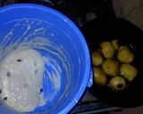 A picture of step 3 of Puff puff with dry fruit.