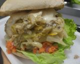 Foto del paso 10 de la receta: Sándwich con muchos vegetales y pollo🥙🥯🧅🍆🍗🥪