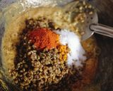 A picture of step 2 of Dana Methi stuffed Mirchi.