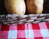 A picture of step 1 of Baked potatoes KumpirTurkish style.
