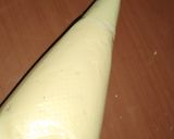 A picture of step 15 of Custard filled Donuts.