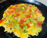 A picture of step 2 of Cheesy broccoli omelette.