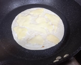 Foto del paso 2 de la receta: Tortipizza de champiñones, pistachos y queso