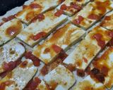 Foto del paso 4 de la receta: Pizza mitad anchoas, mitad olivas negras