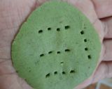 A picture of step 4 of Jowar Spinach Mathri.