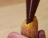 A picture of step 9 of Chocolate hazelnut churros.