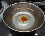 A picture of step 3 of Ground nut chikki.