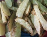 A picture of step 7 of Spiced potato wedges#Festive dish contest Nairobi West.
