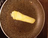 A picture of step 3 of Sooji(Semolina) Patisapta - Coconut stuffed Bengali style.