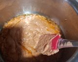 A picture of step 6 of Gajar ka halwa with peels.