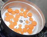 A picture of step 2 of Carrot Puree for 7+ Months Babies.