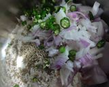 A picture of step 2 of Ragi onion rava dosa with hotel style coconut chutney.